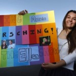 Allison Draper holding Annie Wersching on Ellen sign